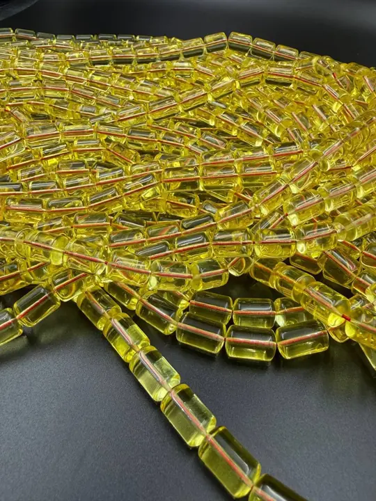Across the run — amber misbaha strands in production quantity at the VIAMBER atelier
